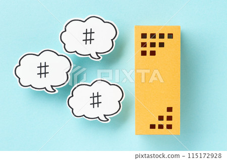 Apartment and speech bubble hashtag building real estate # 115172928