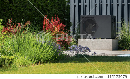 Outdoor heat pump unit near a swimming pool with decorative plants. 115173079