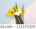 a bouquet of daffodils with a butterfly on it 115173329