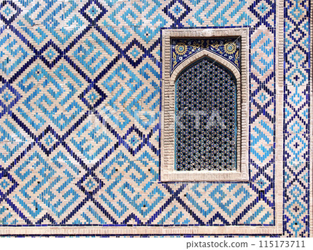 Window with tile decor on wall of Sher-dor Madrassah (Sher Dor (Lion) Medressa), Registan complex, Samarkand, Uzbekistan 115173711