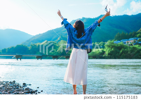 A woman enjoying the Shimanto River A woman enjoying the Shimanto River 115175183
