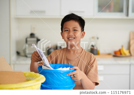 Vietnamese Boy Sorting Waste 115176971
