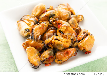 Delicious smoked mussels 115177452