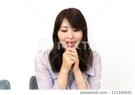 A woman relaxing at home A woman relaxing at home 115180081