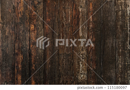 Horizontal background image of the surface of an old wooden wall with peeling varnish and brown grain Horizontal background image of the surface of an old wooden wall with peeling varnish and brown grain 115180097