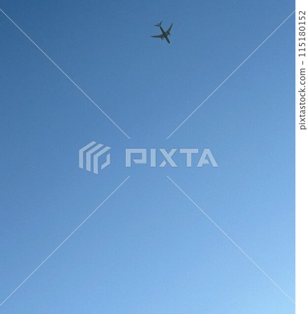 Airplane flying blue sky 115180152