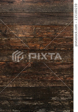 Vertical background image of the surface of an old wooden wall with peeling varnish and brown grain Vertical background image of the surface of an old wooden wall with peeling varnish and brown grain 115180239