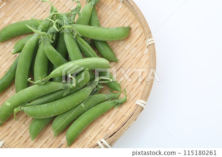 Snap peas in a basket 115180261