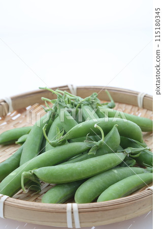 Snap peas with monkeys, diagonal top view 115180345