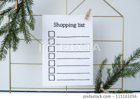 Preparation for winter holidays. SHOPPING LIST text on paper note. Celebration gifts and presents preparing Natural zero waste homemade Christmas decor. Happy new year Preparation for winter holidays. SHOPPING LIST text on paper note. Celebration gifts and presents preparing Natural zero waste homemade Christmas decor. Happy new year 115181856