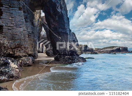 Natural arches on beach. Natural arches on beach. 115182404