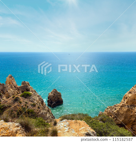 Atlantic rocky coast ( Lagos, Algarve, Portugal). 115182587