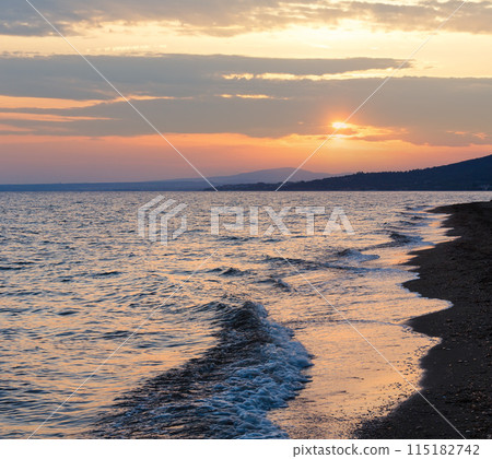 Sea sunset on beach, Greece. 115182742