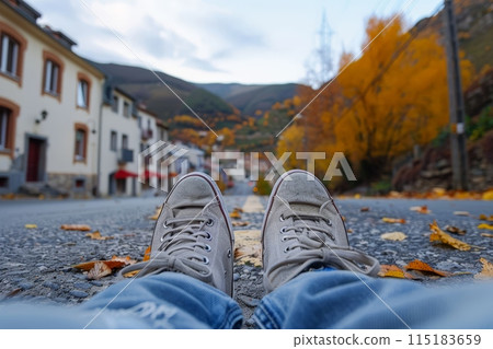 Relaxed Feet on Autumn Street in Small Town 115183659