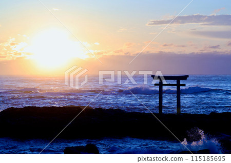 Floating torii gate and sunrise, Oarai Beach, early June 115185695