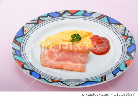 Breakfast staple: Healthy omelette and bacon plate 115186557