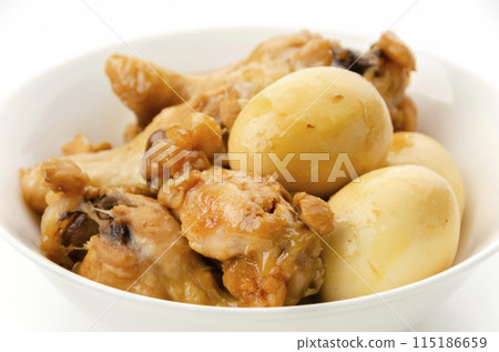 Chicken wings and eggs simmered in sweet and spicy sauce 115186659