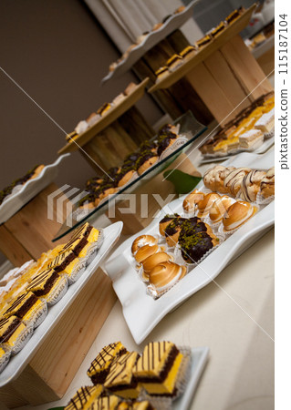 Delightful Dessert Buffet with exquisite pastries and delectable sweets elegantly presented 115187104
