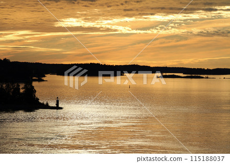 View from a cruise ship across Lake Mälaren during the midnight sun 115188037