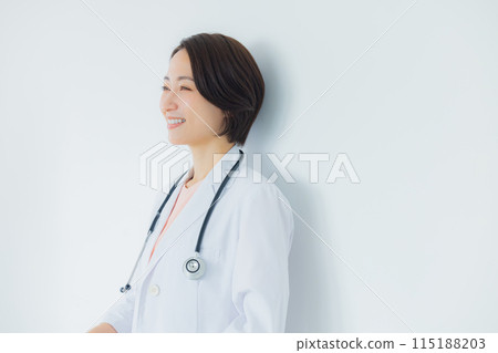 A woman in a white coat A woman in a white coat 115188203