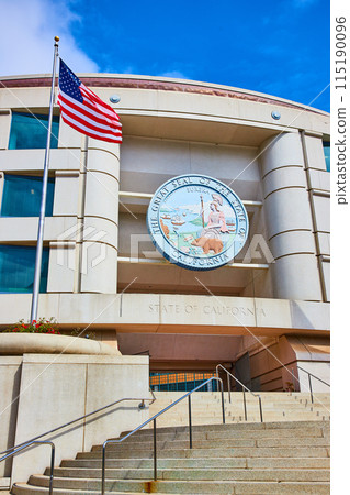American Flag beside Public Utilities Commission building in California 115190096