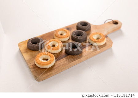 Baked donuts on a cutting board Baked donuts on a cutting board 115191714