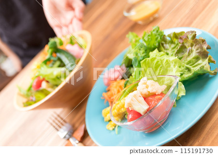 A simple green salad on the table A simple green salad on the table 115191730