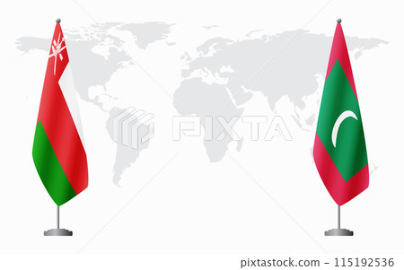 Oman and Maldives flags for official meeting 115192536