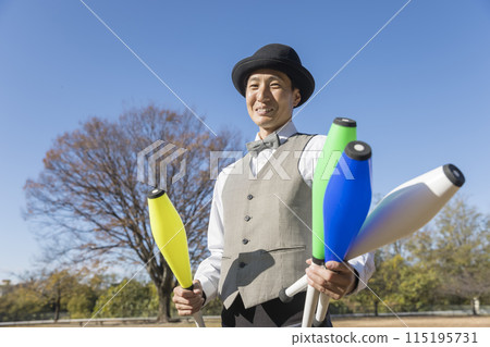 image of a man juggling 115195731