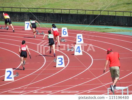 Start of the women's 400m relay at the track and field meet 115196480