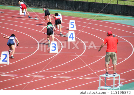 Start of the men's 400m relay at the track and field meet 115196873
