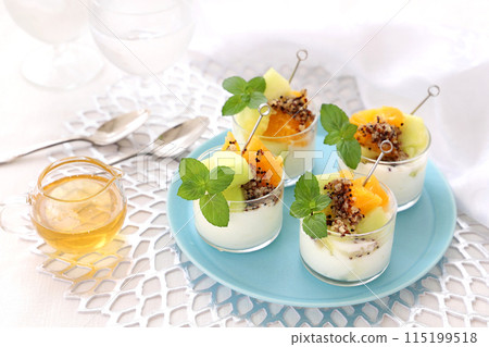 Yogurt topped with quinoa and fruit Yogurt topped with quinoa and fruit 115199518