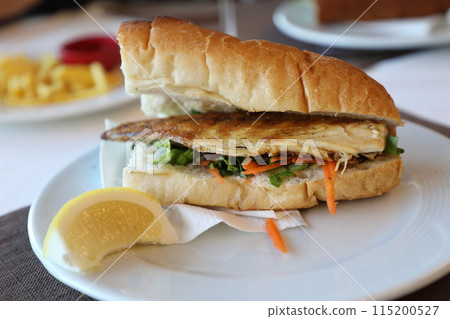 Mackerel sandwich ordered at a restaurant in the area under the Galata Bridge in Istanbul 115200527