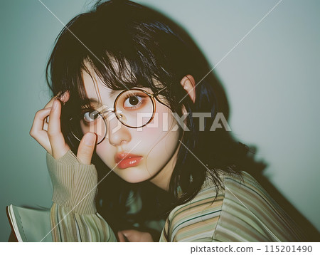 Japanese woman with glasses who loves books 115201490