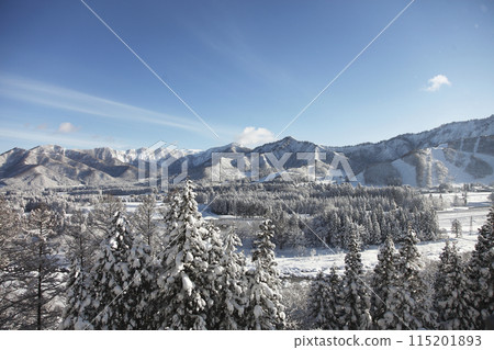 The morning after snowfall, clear skies in the mountains 115201893