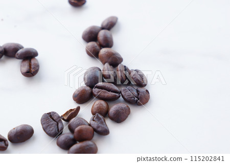 Dark roasted coffee beans 115202841
