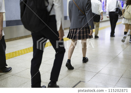 The feet of a walking high school girl The feet of a walking high school girl 115202871