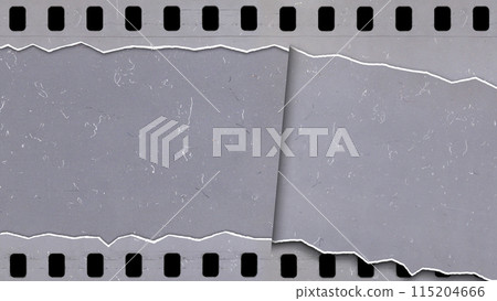Tearing an old, used and dusty celluloid film strip Tearing an old, used and dusty celluloid film strip 115204666
