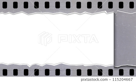 Tearing an old, used and dusty celluloid film strip Tearing an old, used and dusty celluloid film strip 115204667