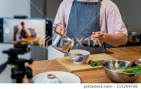 The chef is broadcasting live from workshop how to prepare a vegetarian massaman curry The chef is broadcasting live from workshop how to prepare a vegetarian massaman curry 115204786