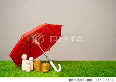 Family figures with coins stand under a red umbrella. Property, life, health and finance insurance concept. Endowment policy. Financial protection 115205325