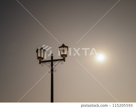 A landscape with a streetlight A landscape with a streetlight 115205593