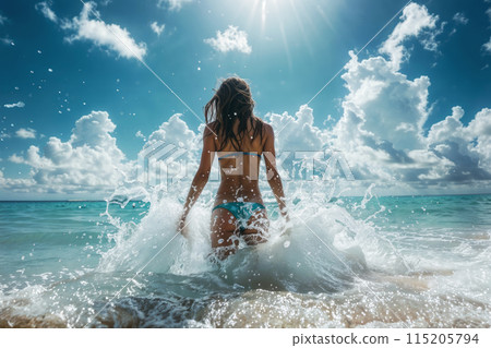 Joyful beach day, woman splashing in the ocean 115205794