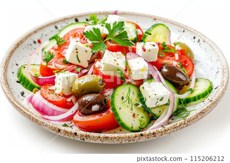 Greek salad in light plate isolated, villages salad, horiatiki salat made with tomatoes, diced feta 115206212