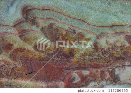 Surprisingly colorful layers in the structure of a piece of ancient marble, a variety of patterns, growths that have formed over a long time. Screensaver background, wallpaper Surprisingly colorful layers in the structure of a piece of ancient marble, a variety of patterns, growths that have formed over a long time. Screensaver background, wallpaper 115206565
