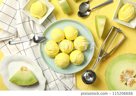Ice cream scoops in a bowl with slices of fresh melon 115206688
