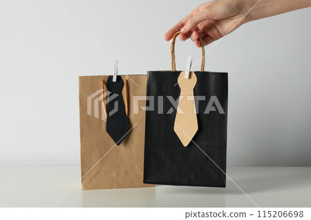 The concept of a gift for father's day, on a white background. The concept of a gift for father's day, on a white background. 115206698