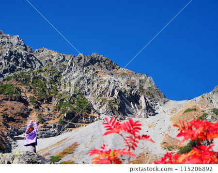 A refreshing morning in Karasawa. A woman stretching. A refreshing morning in Karasawa. A woman stretching. 115206892