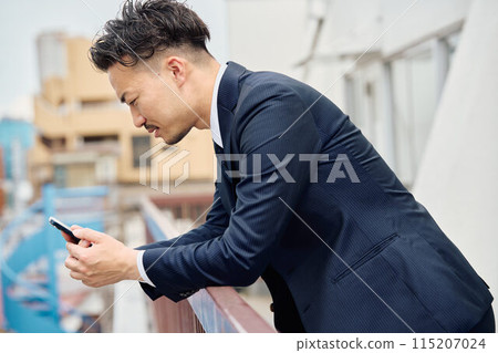 A depressed businessman 115207024