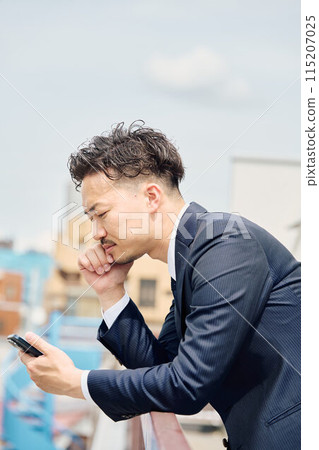 A depressed businessman 115207025